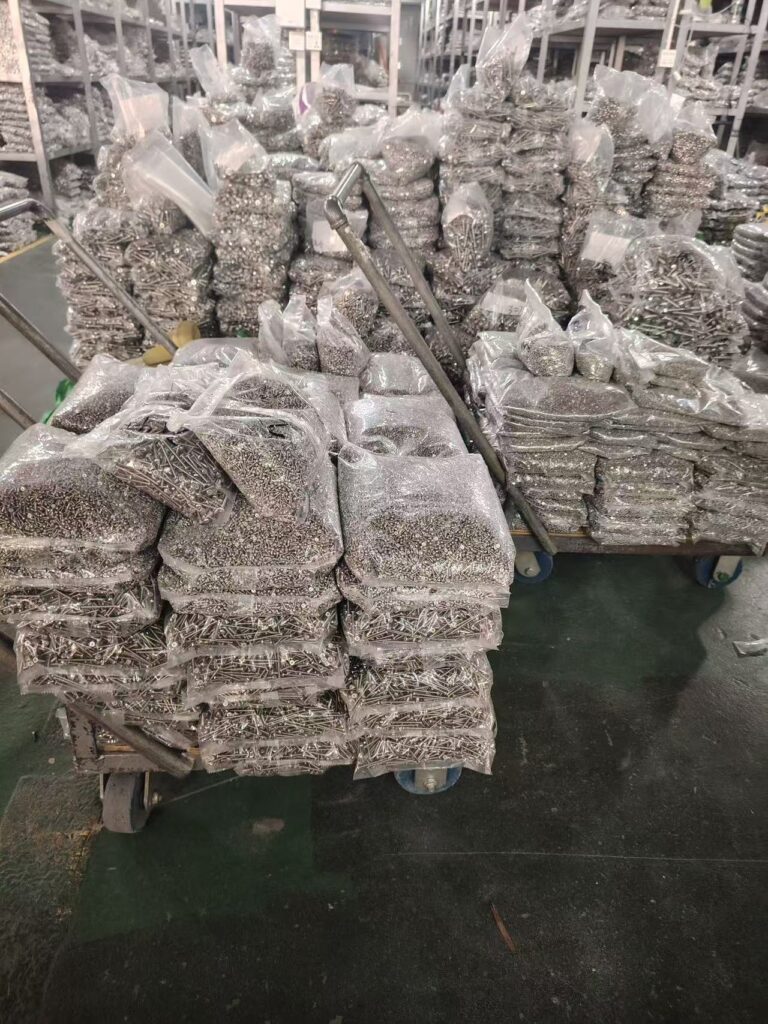 High-quality industrial fasteners in bulk storage - Youjia Metals.